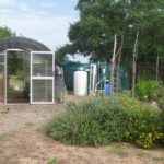 photo of the Greenhouse and Rainwater System